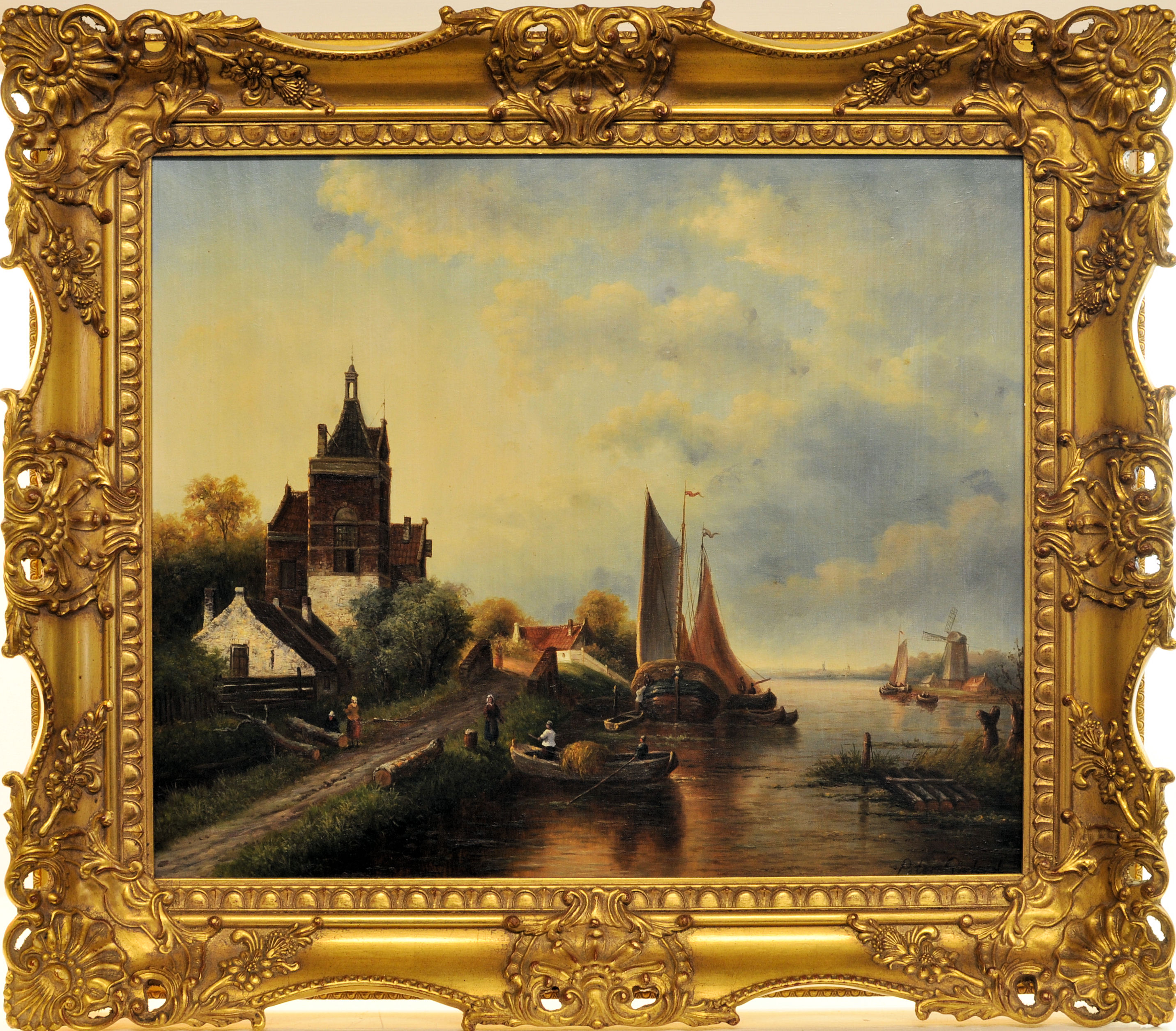 An indistinctly signed Oil on Board of a Dutch river landscape with sailing vessels, buildings,