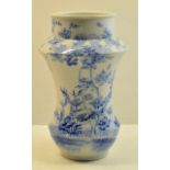 A Japanese Vase of waisted form decorated in blue and white with flowers, leaves, etc., 10" (
