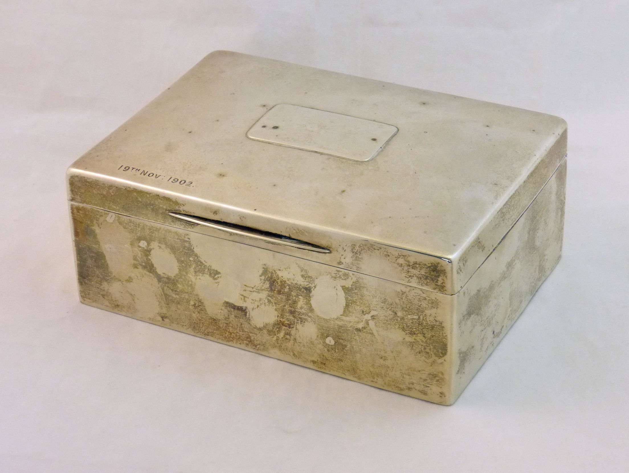 A silver Cigar Box of rectangular form, London 1901, 7 1/2" (20cms) long.