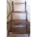 A Victorian rosewood four tier Whatnot with spiral turned pilasters, 2' 3" (69cms) wide.