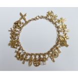 'The Bracelet of the Millennium', a 9ct. gold belcher link Bracelet hung with twenty five 9ct.