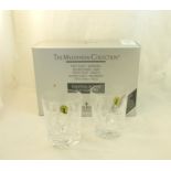 A pair of Waterford Millennium Collection glass Tumblers, boxed.