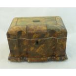 A mid 19th century tortoiseshell Tea Caddy, the interior fitted with two covered containers, on