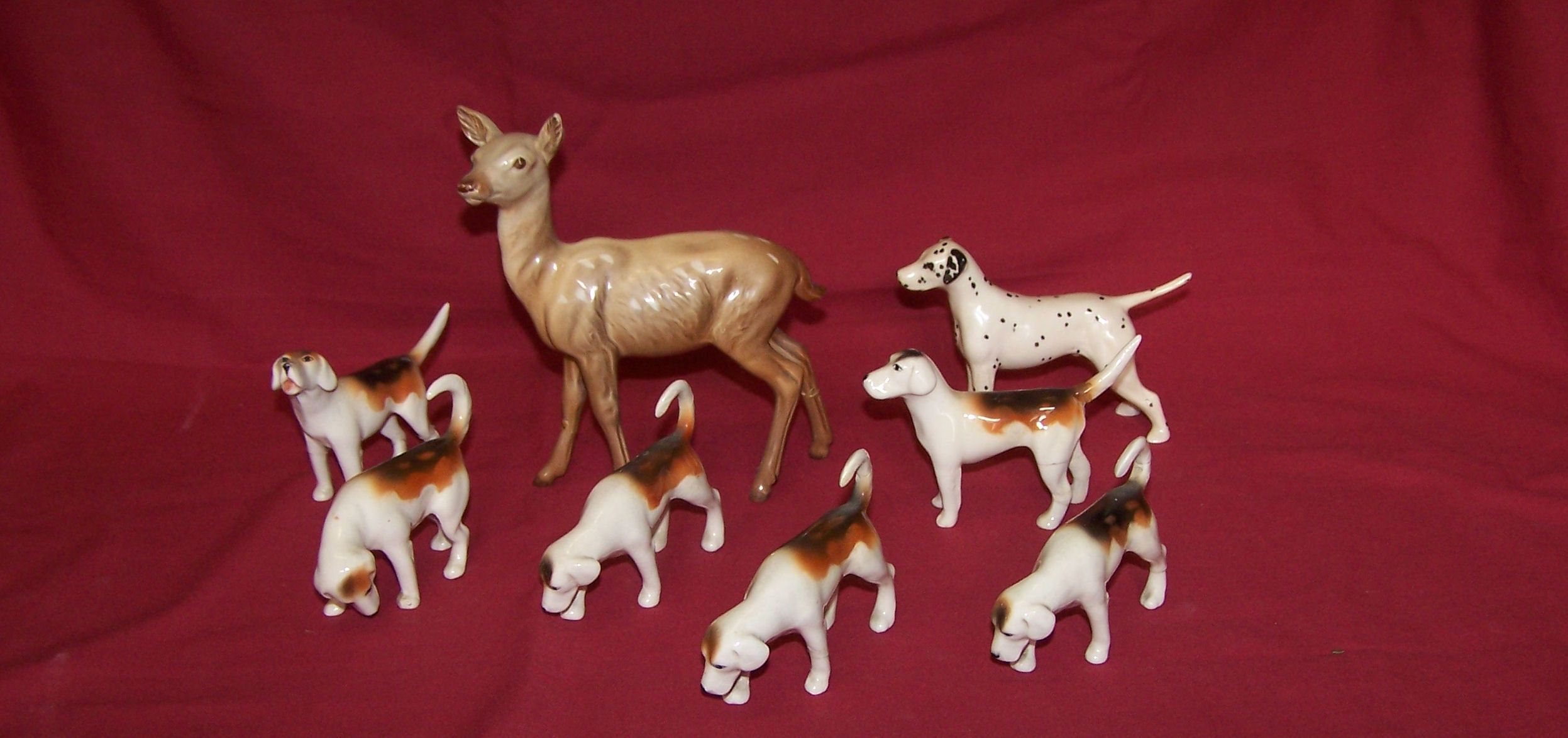 Six various Beswick Fox Hounds, a Beswick Dalmatian, and a Beswick Deer (a/f).