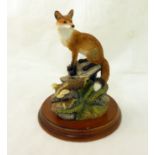 A Border Fine Arts Figure of a fox "Watching and Waiting".
