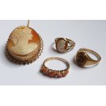 A 9ct. gold Signet Ring set with a tiger's eye quartz tablet, a 9ct. gold coral and seed pearl ring,