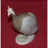A Royal Copenhagen Model of a Guinea Fowl, no. 1086, 5 1/2" (14cms) high.