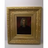 An unsigned half length Oil Portrait of a Clergyman in 18th century dress, 9 1/2" (24cms) x 7 1/