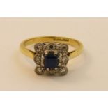 A gold sapphire and diamond Ring, the central square sapphire surrounded by eight eight-cut