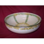 A Royal Doulton Secessionist pattern Bowl decorated with yellow flowers, D2625, 15" (38cms)