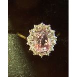 An 18ct gold pink sapphire and diamond Cluster Ring.