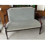 An early 20th century mahogany frame small Settee of Adam design with rosette and dentil carving,