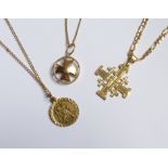 A 9ct. gold St. Christopher Pendant on chain, another chain marked 14K with a cross pendant marked