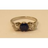 A platinum three stone sapphire and diamond Ring, marked Plat.