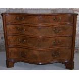 A George III mahogany serpentine fronted Chest of four long graduated drawers with moulded edge