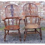 A Victorian beech and elm Windsor high back Elbow Chair with pierced splat, swept arms, panel seat