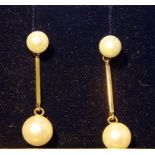 A pair of 9ct gold Pendant Earrings, each set with two cultured pearls.