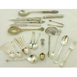 A set of six silver Coffee Spoons, a Dutch silver Straining Spoon, a Chinese silver Teaspoon, and