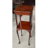 A mahogany square top two tier Jardiniere Stand inlaid with boxwood stringing and on slender