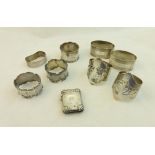 A pair of silver Napkin Rings with pierced decoration, Sheffield 1944; another silver pair with