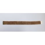 A 9ct. gold Bracelet of two colour woven design.  (45.5gms).