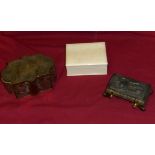 An ivory oblong Box and Cover, 5" (13cms) wide; an Indian brass Box with engraved decoration, and