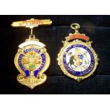 A silver gilt and enamelled Medal for the Bradford & District Master Plumbers Association, and