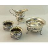 A silver Cream Jug and Sugar Bowl with wavy rims and on hoof feet, Birmingham 1908/9, and a pair