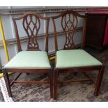 A set of five early 19th century oak Dining Chairs with pierced splat backs, drop-in seats and