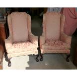A pair of Georgian design mahogany frame wing back Armchairs with swept arms, squab cushion seat,