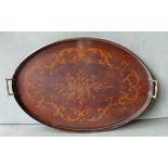 An Edwardian mahogany oval two handled Tray inlaid with floral marquetry and with brass handles, 23"