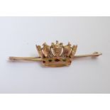 A gold Bar Brooch set with a naval crown with enamel highlights, marked 9ct, 4.3 grams.