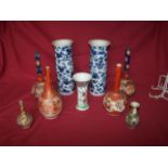 A pair of 19th century Chinese cylindrical Vases decorated with birds and flowers in blue and white,