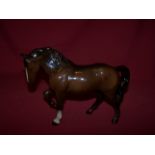 A Beswick model of a stocky jogging Mare, 3rd version, in brown gloss, no. 855.