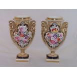 A pair of 19th century Coalport design two handled baluster Vases painted with sprays of spring