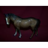 A Beswick model of a brown Mare facing left, in gloss finish, no. 976.