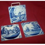 Three Delft blue and white Tiles decorated in religious subjects, each 5" (13cms) square.