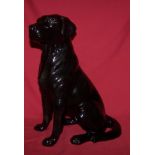 A Beswick Fireside Model of a Black Labrador no. 2314, withdrawn 1989.