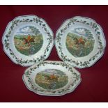 A set of three Wedgwood Plates printed and painted with hunting scene and titled "Cross Country"