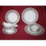 A Spode Kent pattern Dinner Service with a vine and oak leaf border, comprising six dinner plates,