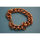 A 9ct gold curb link bracelet.Weight 29.3 grams