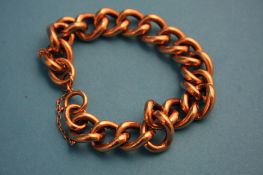 A 9ct gold curb link bracelet.Weight 29.3 grams