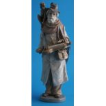 A Lladro figure of a Street Musician, the old man wearing a hat with a monkey on his shoulder,