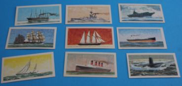 A box containing a large selection of cigarette/tea cards, various.