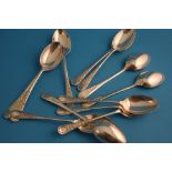 A set of twelve silver teaspoons, Sheffield, various dates, maker's mark Walker and Hall.Weight