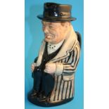 A Toby jug "Winston Churchill" factory sample, colour variation, wearing a beige and black striped