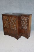 A pair of small oak glazed bookcases.93 cm long