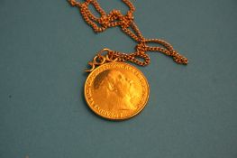 A double sovereign dated 1902 with 9ct gold mount and chain.Total weight 22 grams