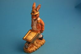 A figure "Rabbit with wheelbarrow", with unusual gold highlights, printed mark (not produced for