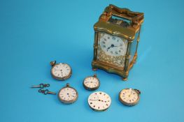 A small brass carriage clock with enamelled dial and a bag of four ladies pocket watches and one